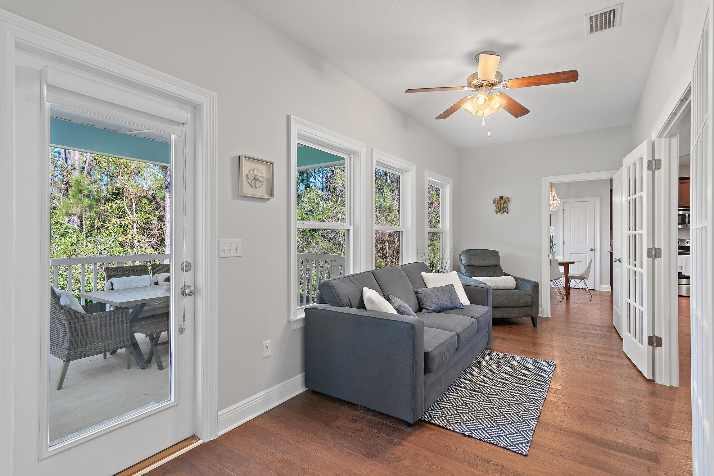 90 Ocean Spray Circle Santa Rosa Beach, FL 32459 - Photo 16 of 57 a living room with furniture and a large window
