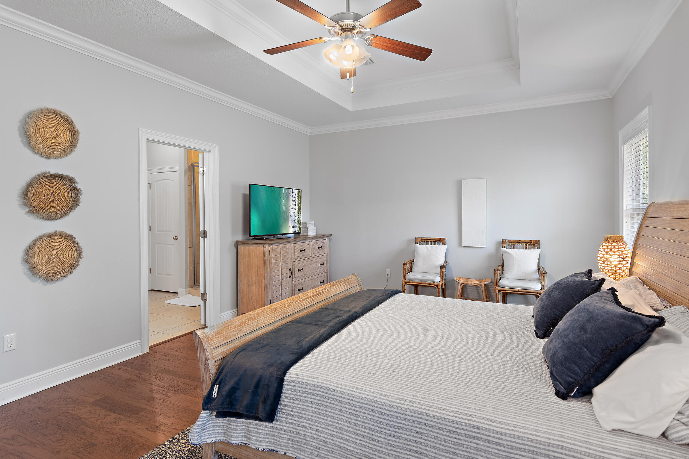 90 Ocean Spray Circle Santa Rosa Beach, FL 32459 - Photo 18 of 57 a bedroom with a bed and cabinets