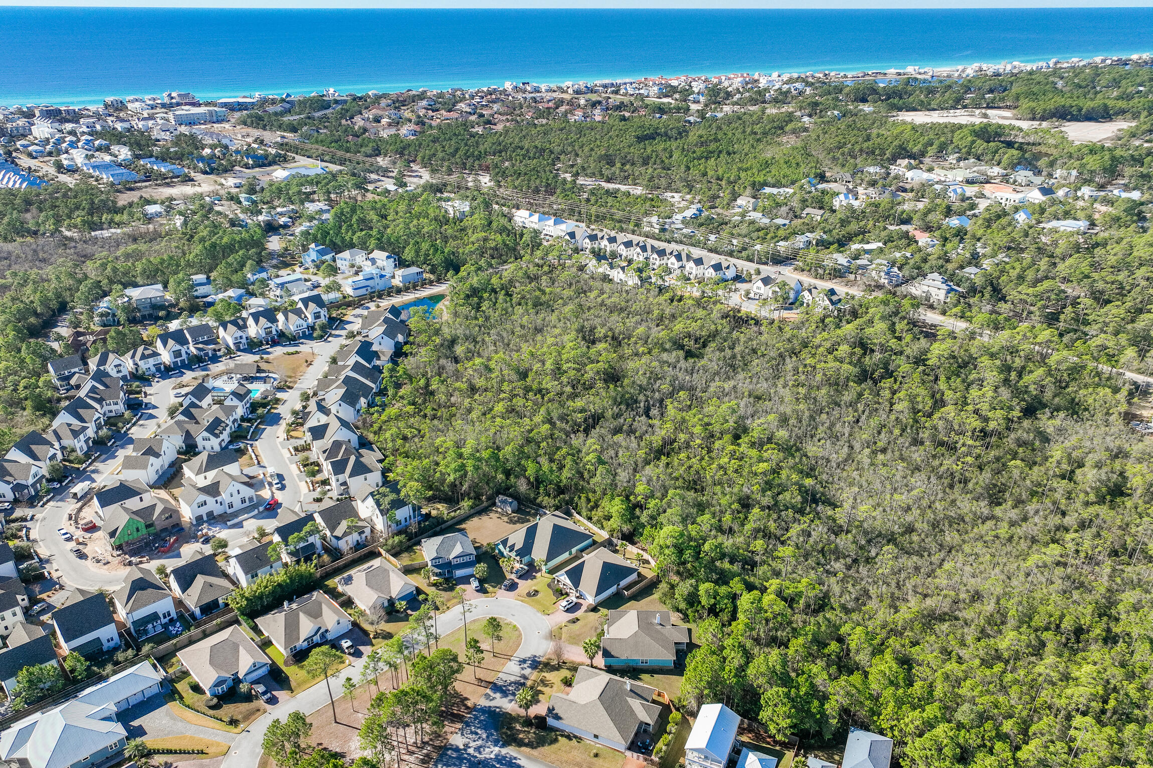 90 Ocean Spray Circle Santa Rosa Beach, FL 32459 - Photo 56 of 57 an aerial view of a residential houses with city view
