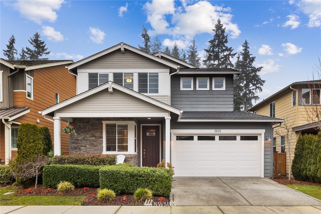 3615 177th Street Southeast Bothell, WA 98012 - Photo 1 of 32 a front view of a house with a yard and garage