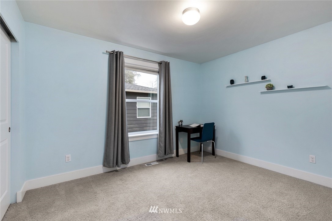 3615 177th Street Southeast Bothell, WA 98012 - Photo 21 of 32 an empty room with furniture and windows