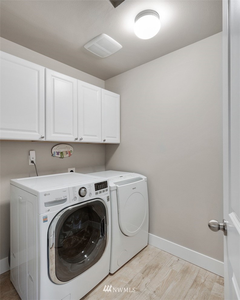 3615 177th Street Southeast Bothell, WA 98012 - Photo 23 of 32 a utility room with dryer and washer