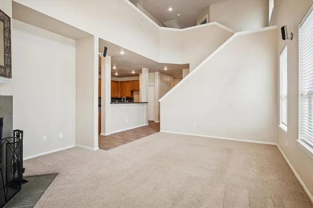 an entryway in a hall with an entryway and livingroom