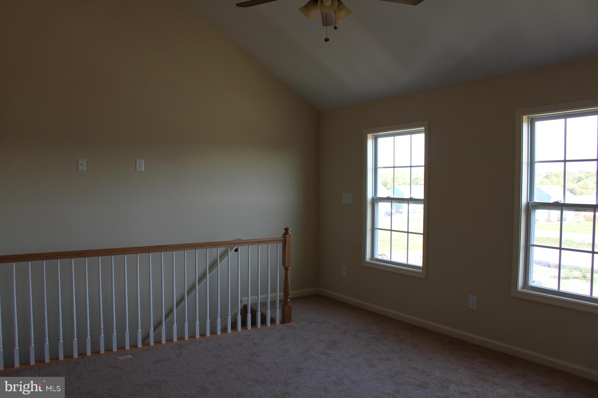 34 Knowledge Court Inwood, WV 25428 - Photo 5 of 12 an entryway with a window in a room