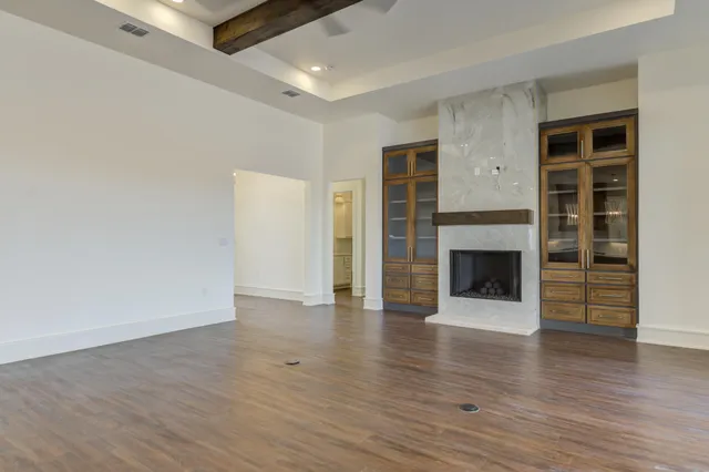 a stove top oven sitting inside of a kitchen