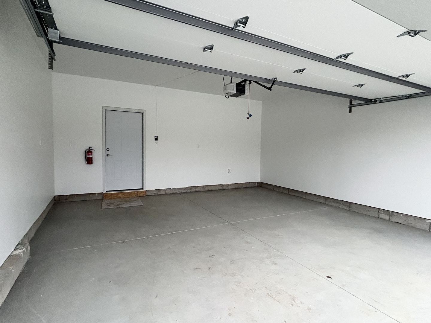 1420 8th Street, Unit 1 Harvard, IL 60033 - Photo 10 of 10 a view of a room with racks on the wall