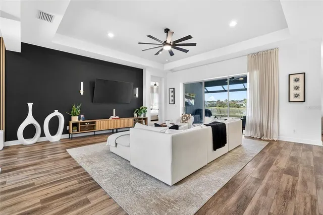 a bedroom with bed and a window