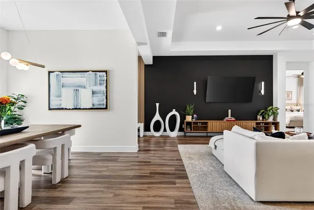 a view of a floor to ceiling window and a table in a room