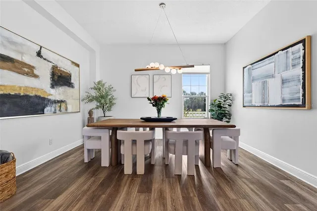 a view of a dining room with furniture window and outside view