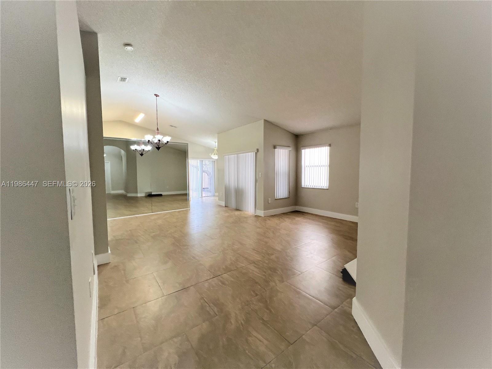 14136 Southwest 149th Place Miami, FL 33196 - Photo 12 of 51 Living Room/Dining area view