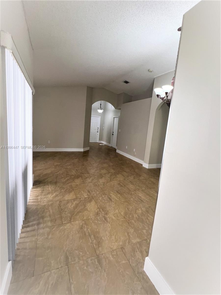 14136 Southwest 149th Place Miami, FL 33196 - Photo 21 of 51 View from Breakfast are to living room/dining area