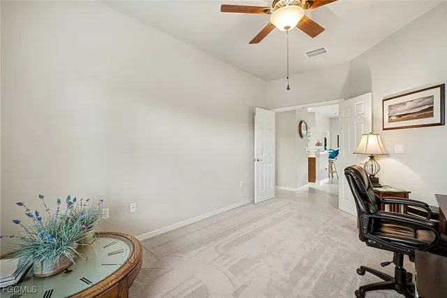 a workspace with furniture and wooden floor
