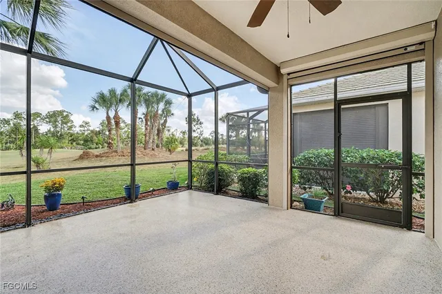 a view of a house with porch and a yard