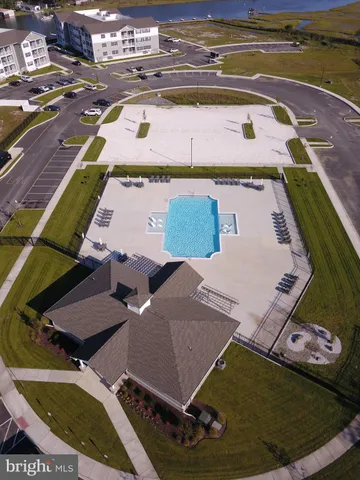 an aerial view of a house with swimming pool
