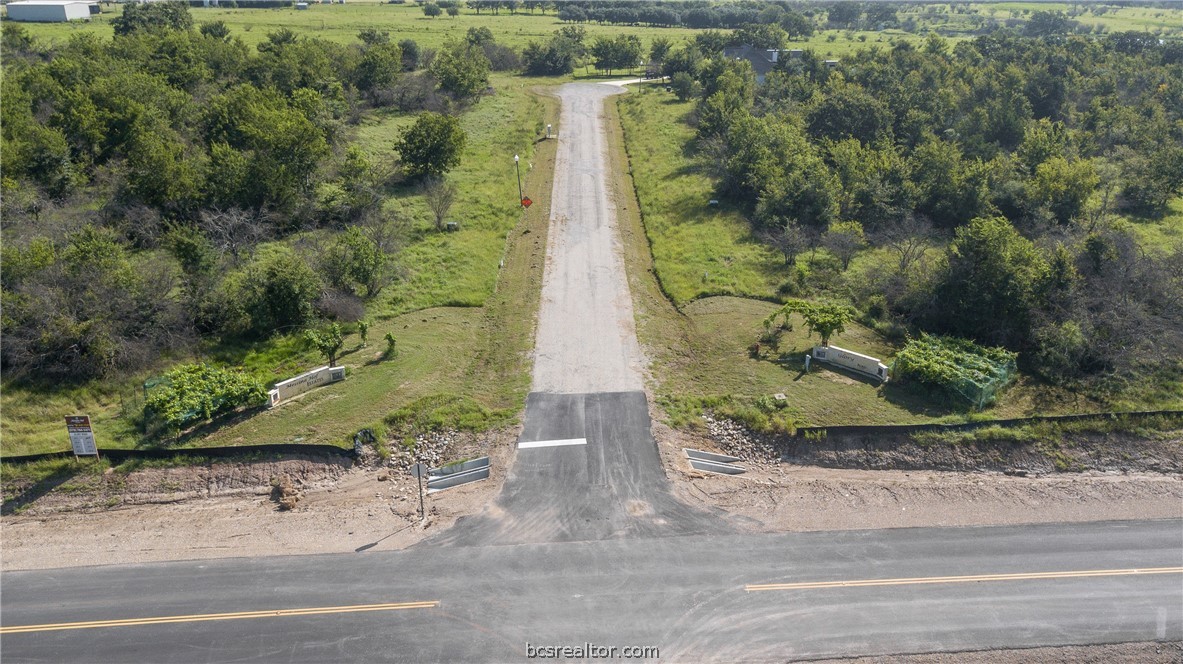 5013 Glory Road Bryan, TX 77808 - Photo 1 of 1 an aerial view of a residential houses with yard and street