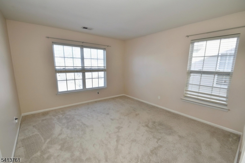 263 Ridge Drive Pompton Lakes, NJ 07442 - Photo 14 of 20 an empty room with a window