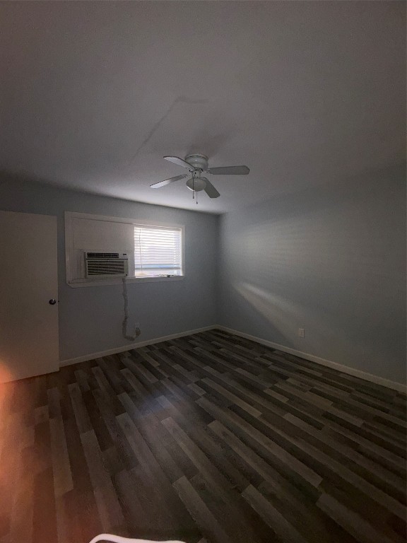 4626 Bell Street, Unit 6 Houston, TX 77023 - Photo 5 of 11 an empty room with wooden floor and windows