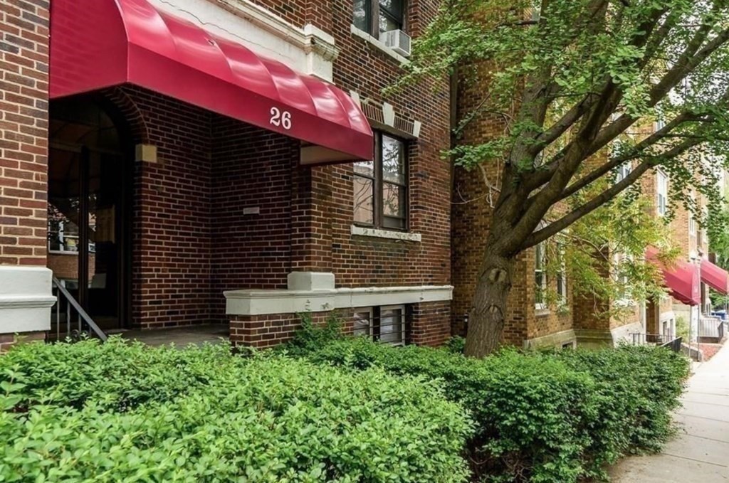 26 Chiswick Road, Unit 6 Boston, MA 02135 - Photo 30 of 31 a front view of a house with a yard