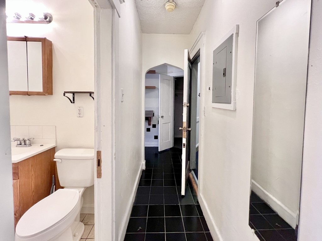 26 Chiswick Road, Unit 6 Boston, MA 02135 - Photo 10 of 31 a bathroom with a toilet and a shower