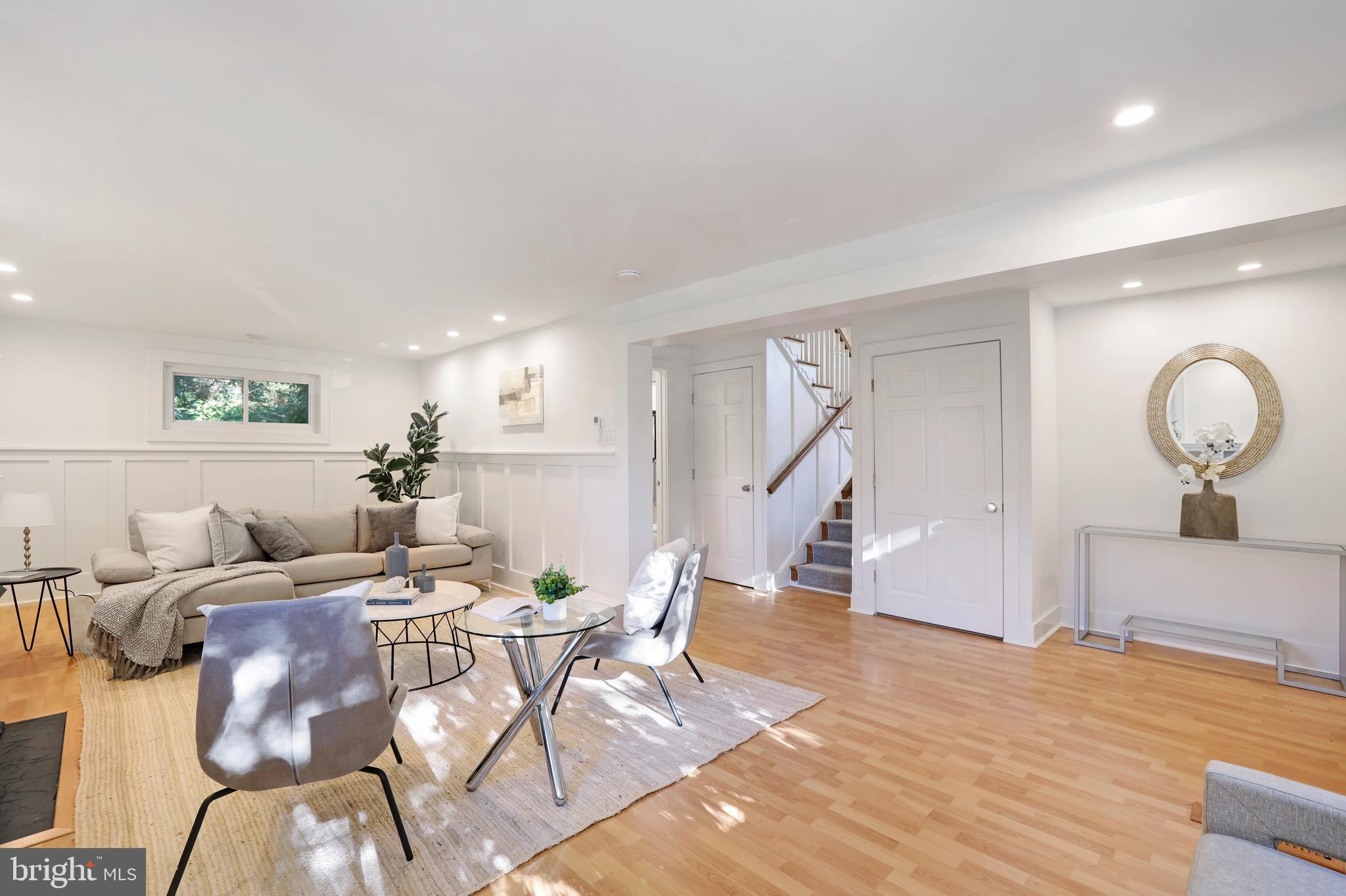11812 Selfridge Road Silver Spring, MD 20906 - Photo 2 of 42 a living room with furniture and wooden floor