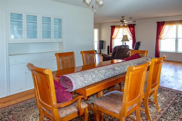a view of dining room and chairs
