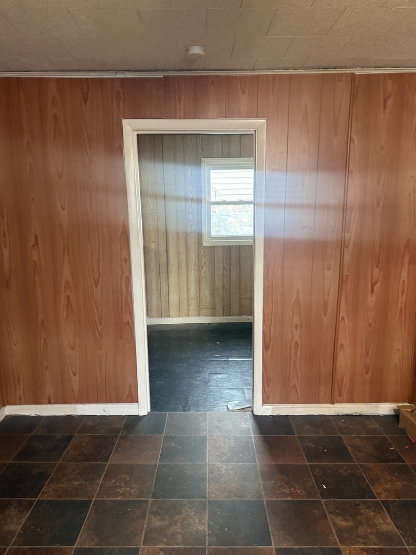 312 East 11th Street Georgetown, IL 61846 - Photo 14 of 25 a view of a closet area with living room