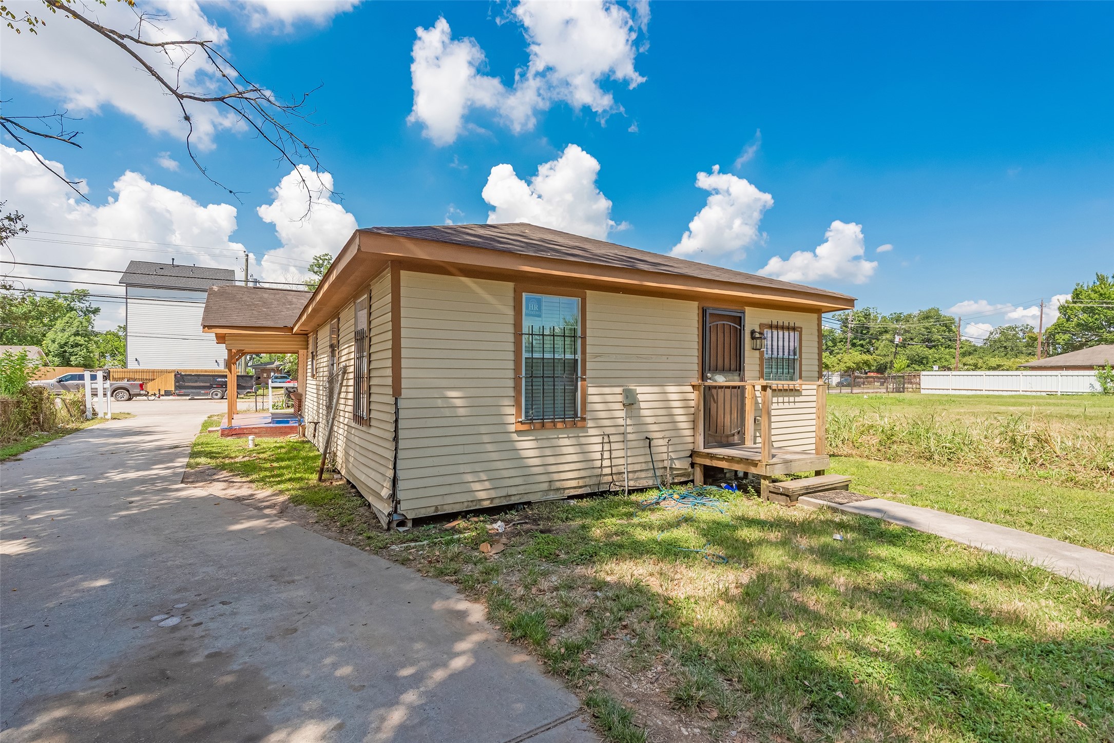 6402 West Montgomery Road, Unit A Houston, TX 77091 - Photo 3 of 23 a front view of a house with a yard