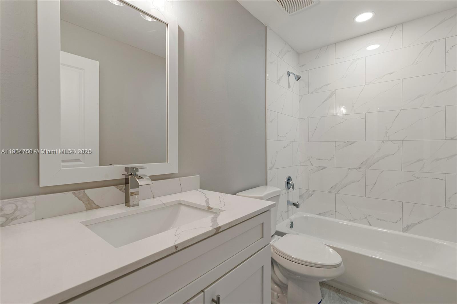 936-938 Countess Avenue Lehigh Acres, FL 33974 - Photo 23 of 24 a bathroom with a sink a toilet and shower