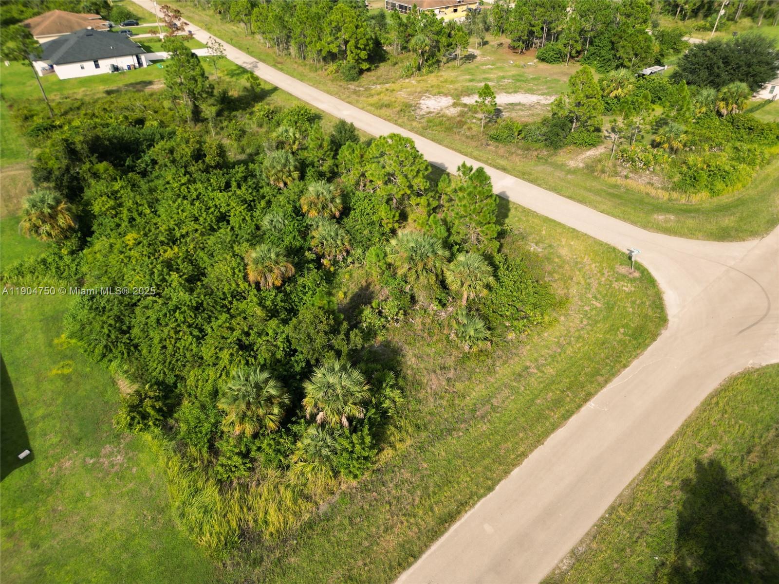 936-938 Countess Avenue Lehigh Acres, FL 33974 - Photo 10 of 24 a view of a lake from a balcony