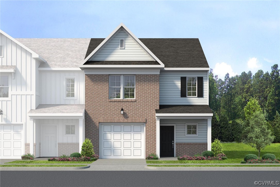 11301 Benton Pointe Way Chester, VA 23831 - Photo 1 of 12 a front view of a house with a yard and garage