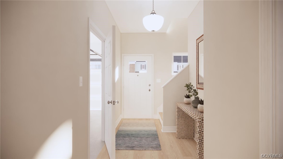 11301 Benton Pointe Way Chester, VA 23831 - Photo 2 of 12 a view of a hallway to a livingroom with furniture