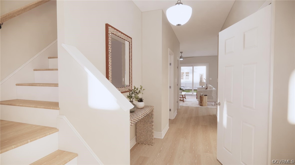 11301 Benton Pointe Way Chester, VA 23831 - Photo 7 of 12 a view of a livingroom with furniture and stairs