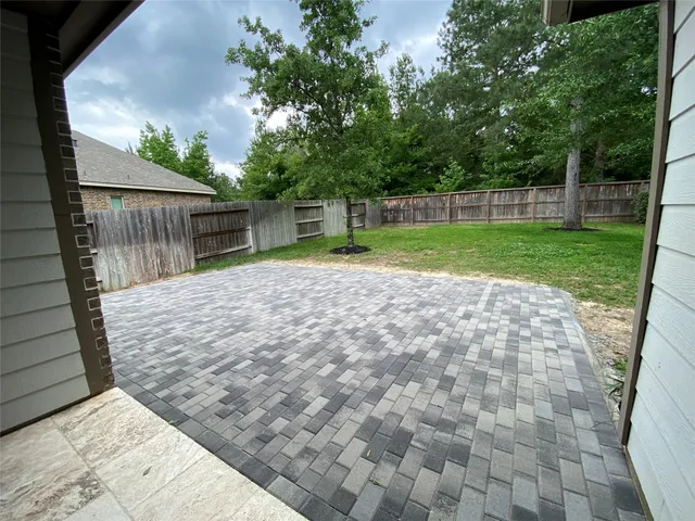 a view of backyard with green space