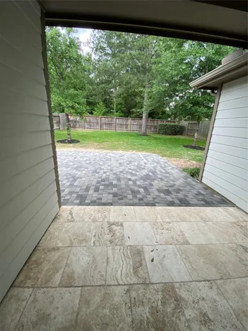 a view of a yard with an outdoor space