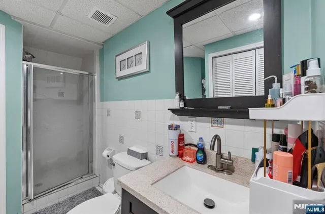 a bathroom with a sink and a shower