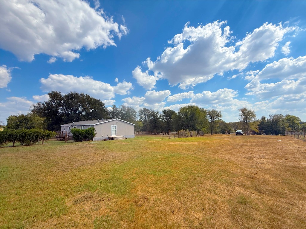 3063 County Road 484 Elgin, TX 78621 - Photo 4 of 29 a view of an ocean and beach