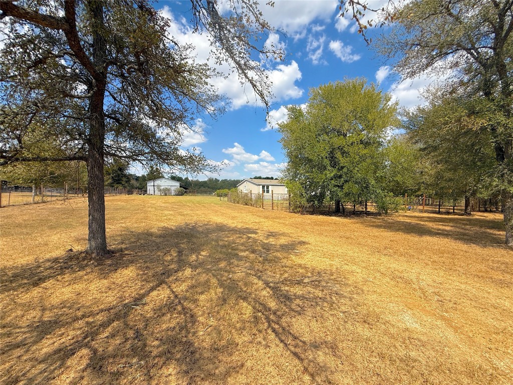 3063 County Road 484 Elgin, TX 78621 - Photo 5 of 29 a view of yard with tree