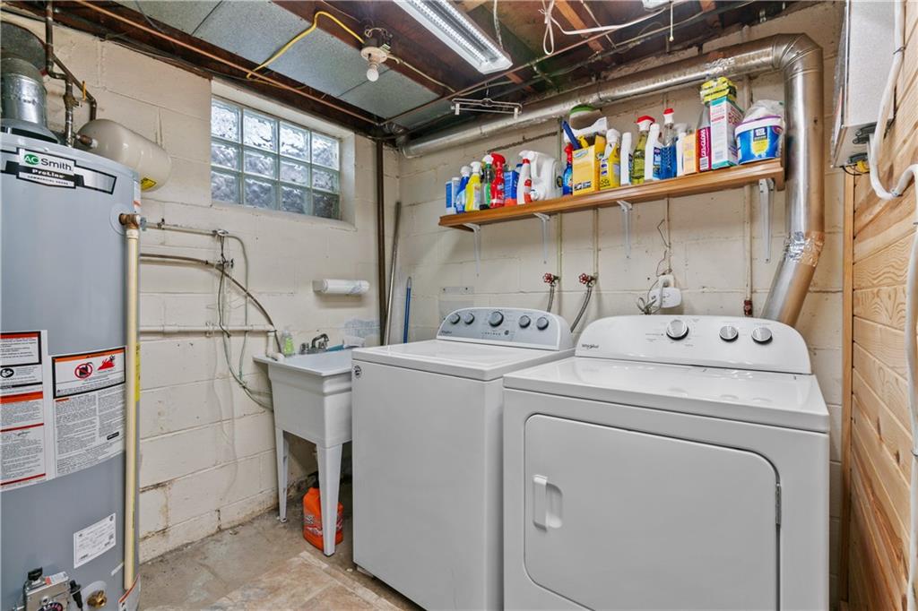 5140 Raintree Drive Pittsburgh, PA 15236 - Photo 22 of 26 a utility room with dryer and washer