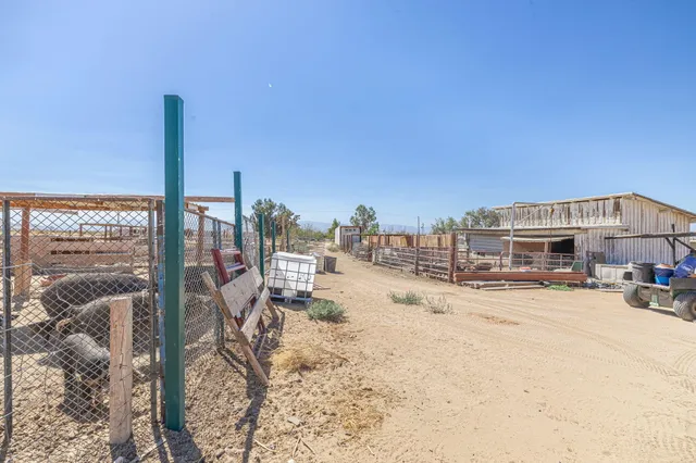 a view of a terrace with wooden fence