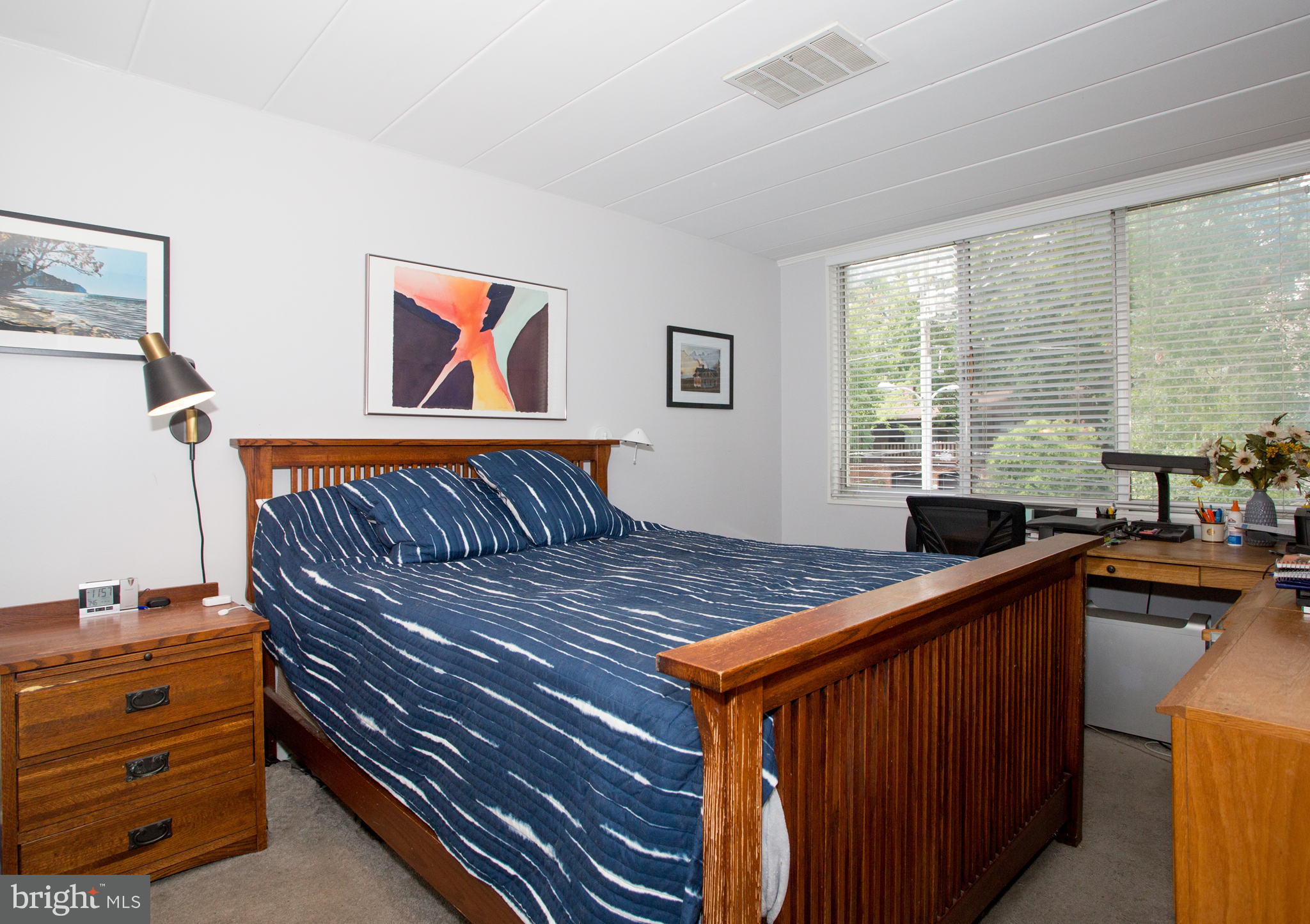 2304 Riddle Avenue, Unit 307 Wilmington, DE 19806 - Photo 12 of 23 a bedroom with a bed and a window