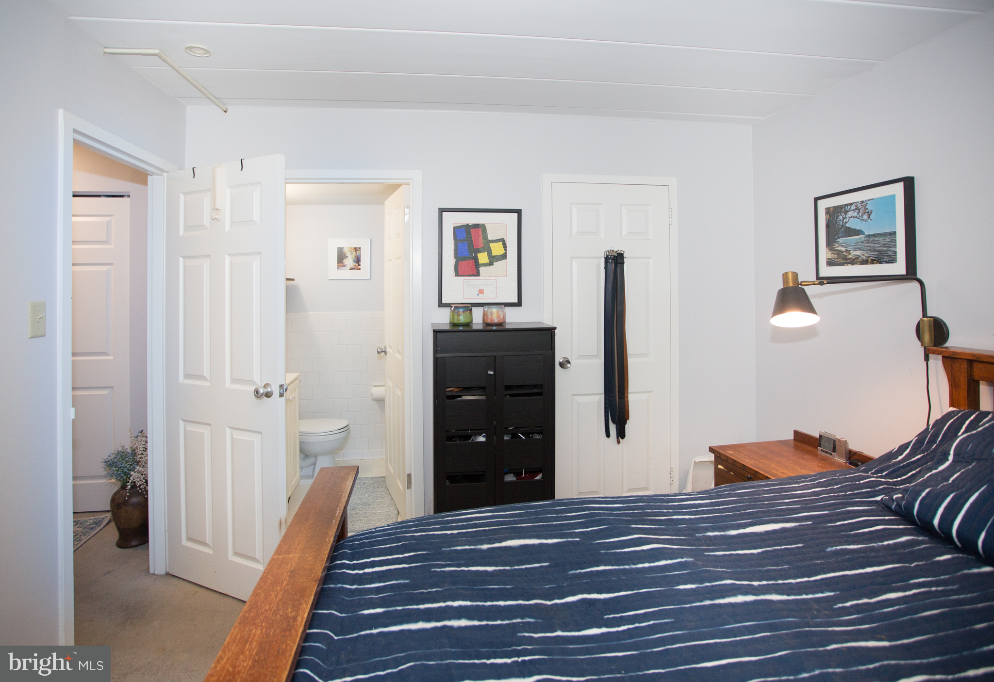 2304 Riddle Avenue, Unit 307 Wilmington, DE 19806 - Photo 13 of 23 a view of a bedroom with wooden floor and closet