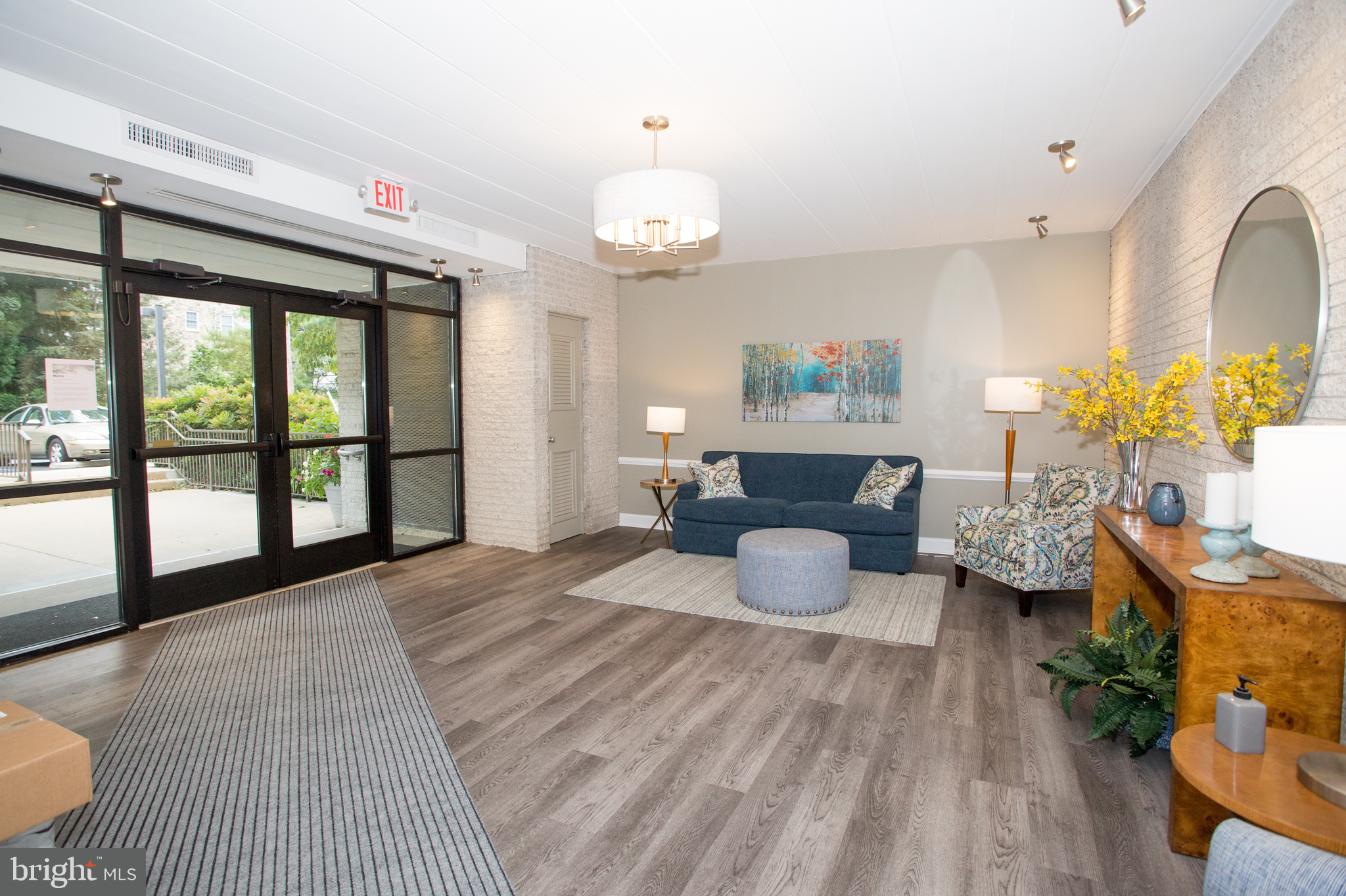 2304 Riddle Avenue, Unit 307 Wilmington, DE 19806 - Photo 5 of 23 a bedroom with furniture and a large window