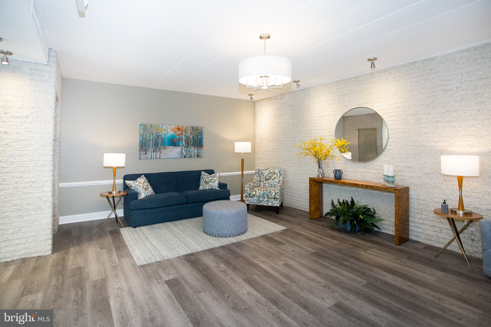 2304 Riddle Avenue, Unit 307 Wilmington, DE 19806 - Photo 6 of 23 a living room with furniture and a fireplace
