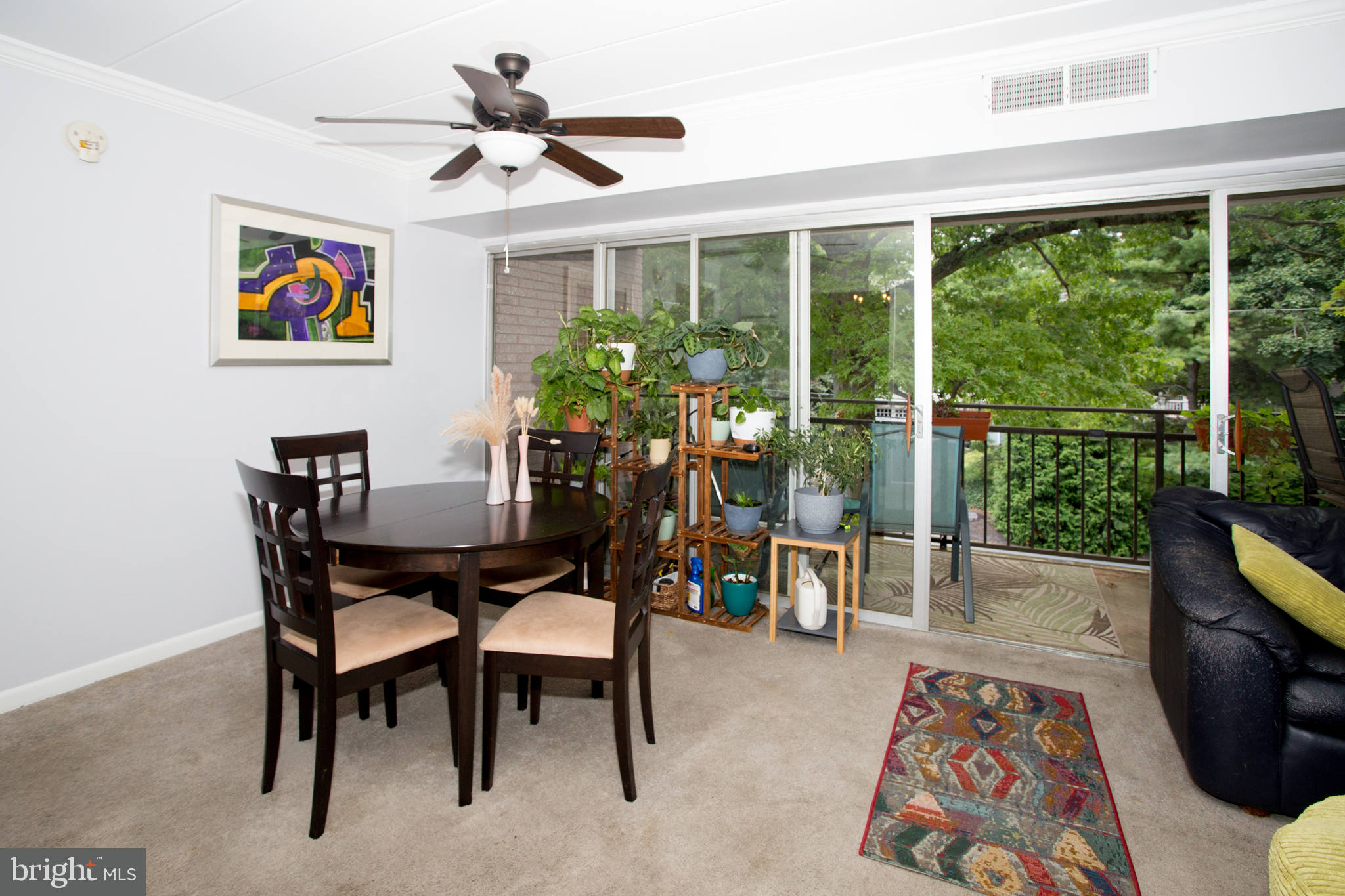 2304 Riddle Avenue, Unit 307 Wilmington, DE 19806 - Photo 9 of 23 a view of a dining room with furniture window and outside view