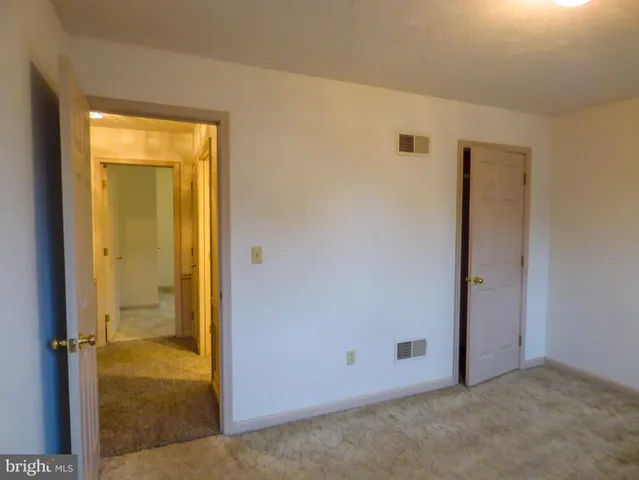 an empty room with a door