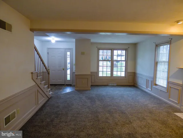 an empty room with windows