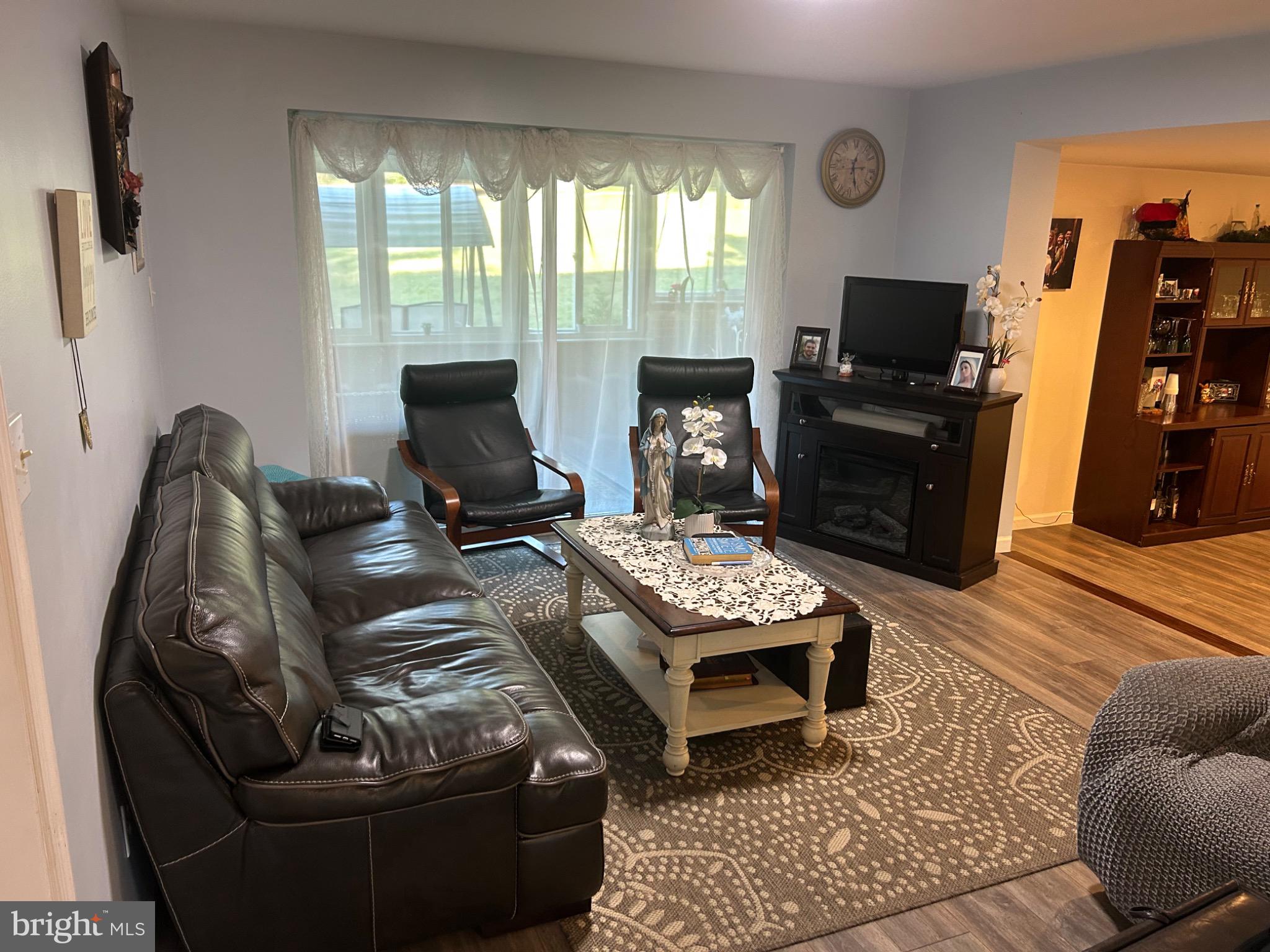 159 Planebrook Road Malvern, PA 19355 - Photo 12 of 30 a living room with furniture and a flat screen tv