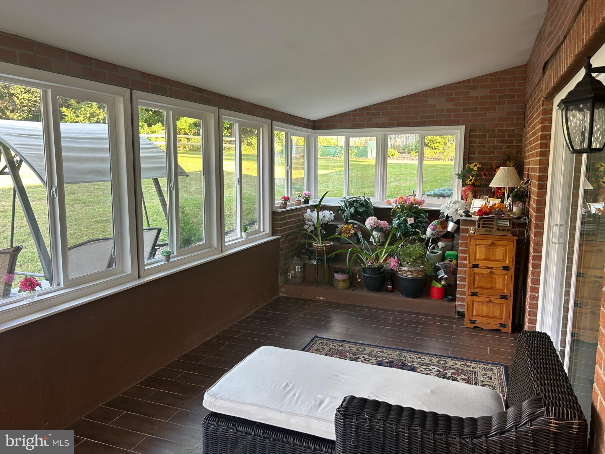 159 Planebrook Road Malvern, PA 19355 - Photo 15 of 30 a living room with furniture large window and a table
