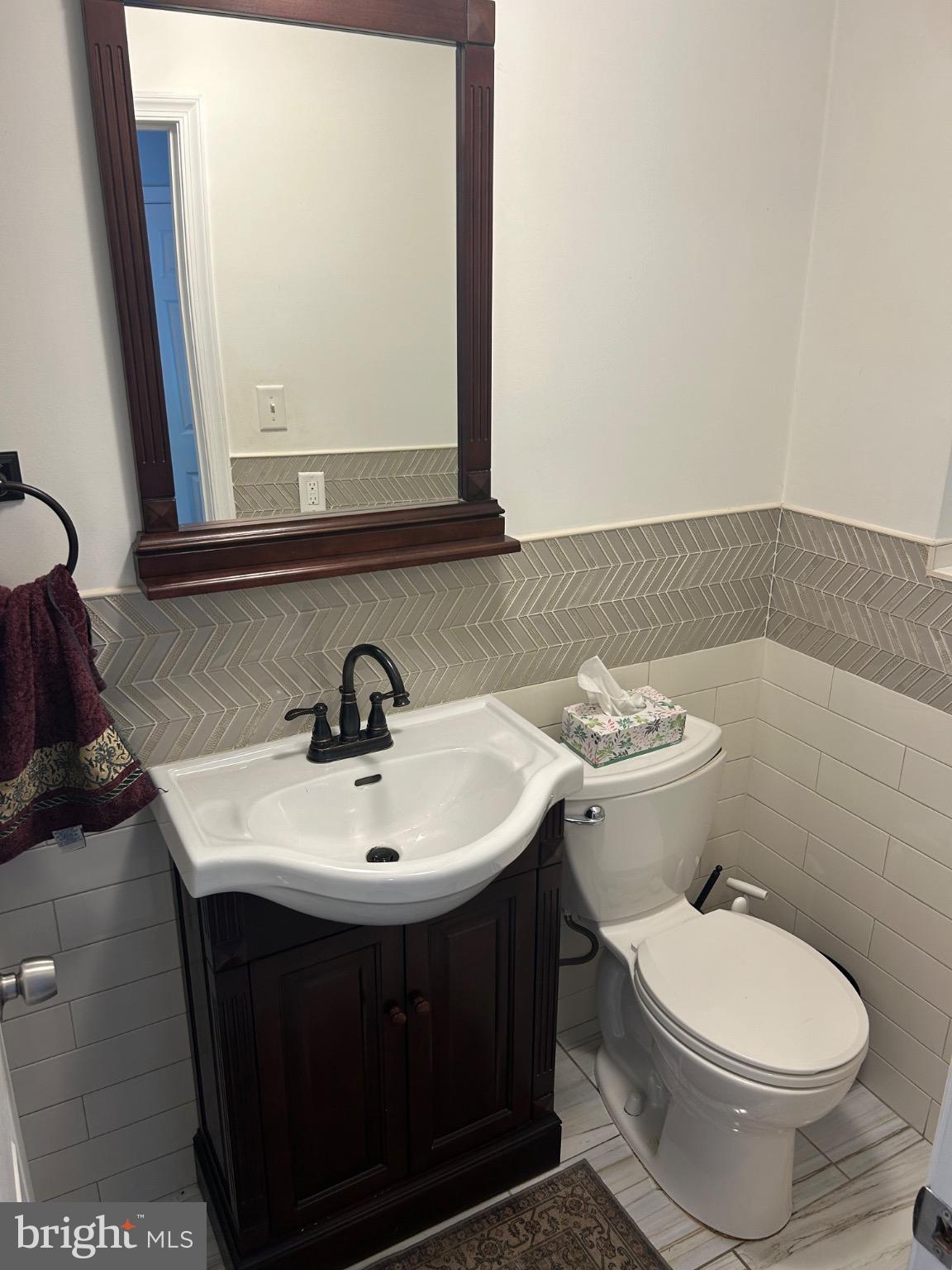 159 Planebrook Road Malvern, PA 19355 - Photo 17 of 30 a bathroom with a sink toilet and mirror