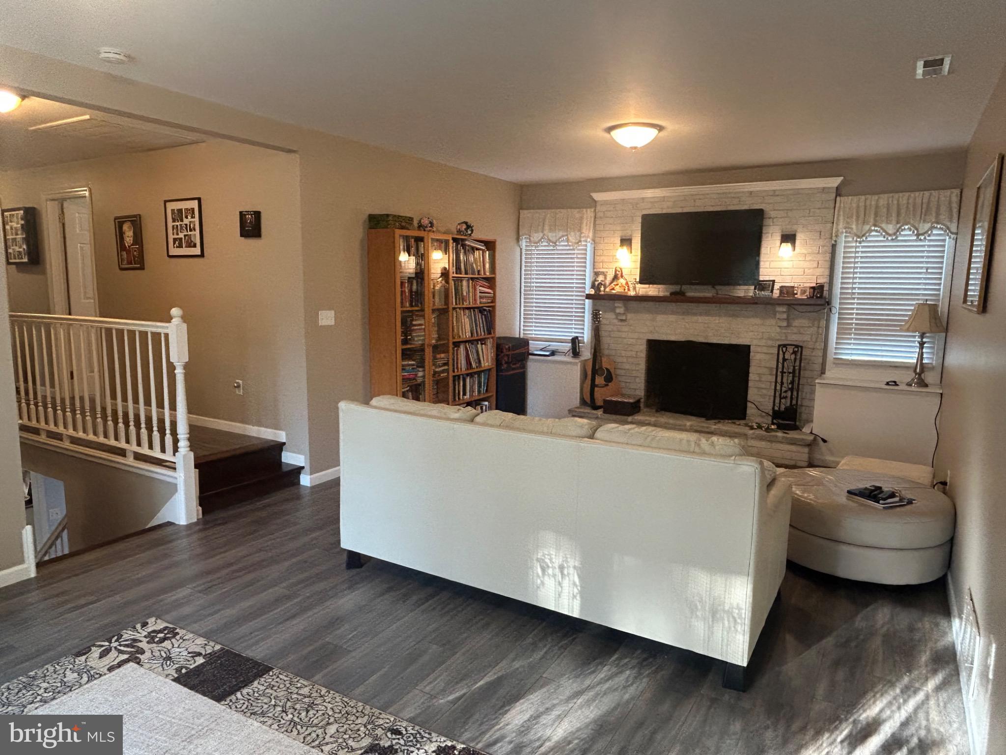 159 Planebrook Road Malvern, PA 19355 - Photo 21 of 30 a living room with furniture and a fireplace